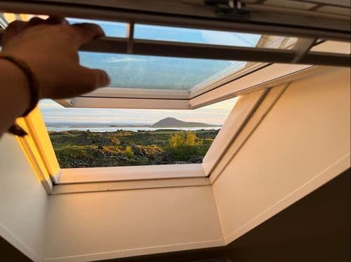 our accomodation_þúfa_balcony_view_midnightsun2.jpg