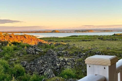 our accomodation_þúfa_balcony_view_midnightsun.jpg